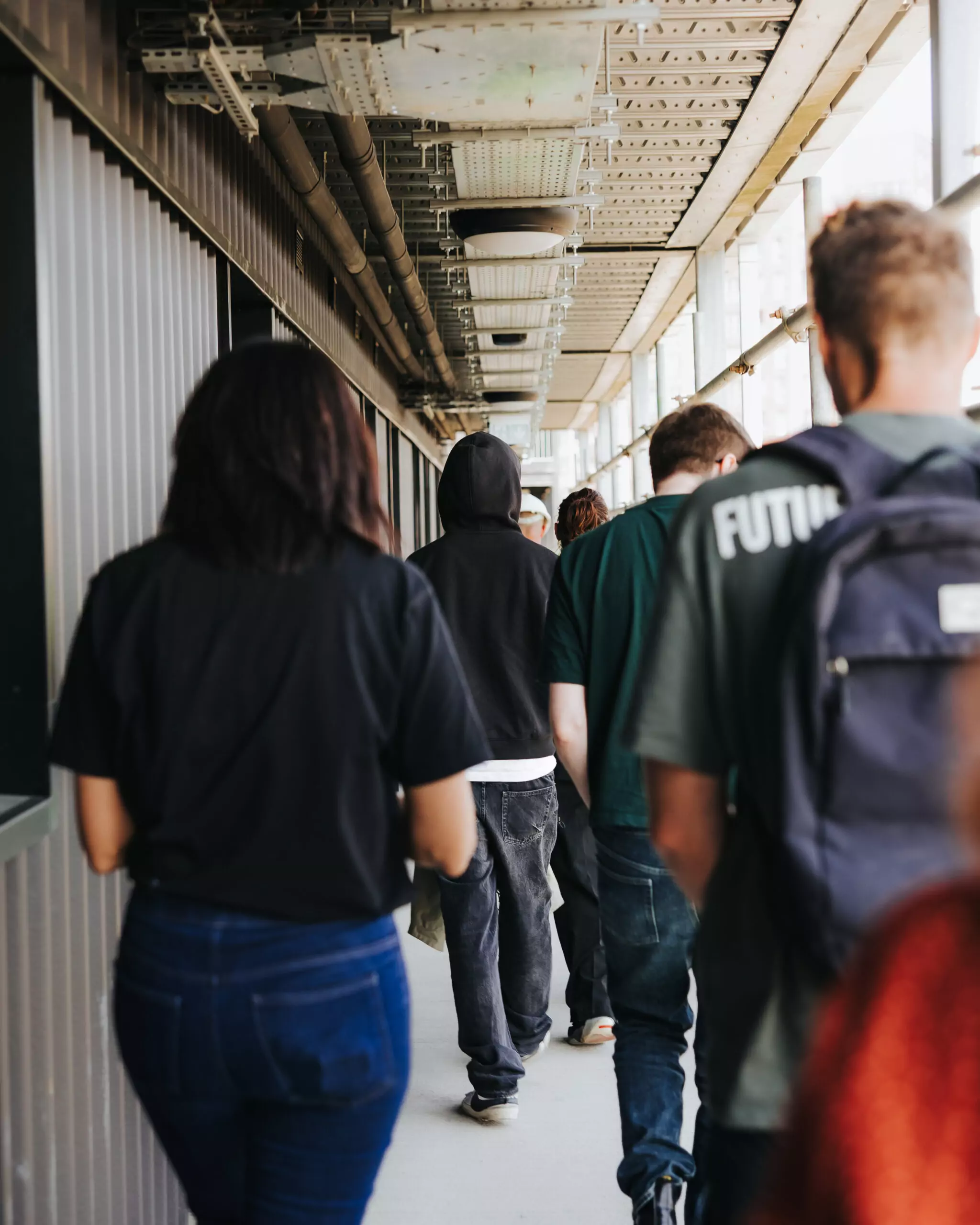 A group of customers tour district lofts